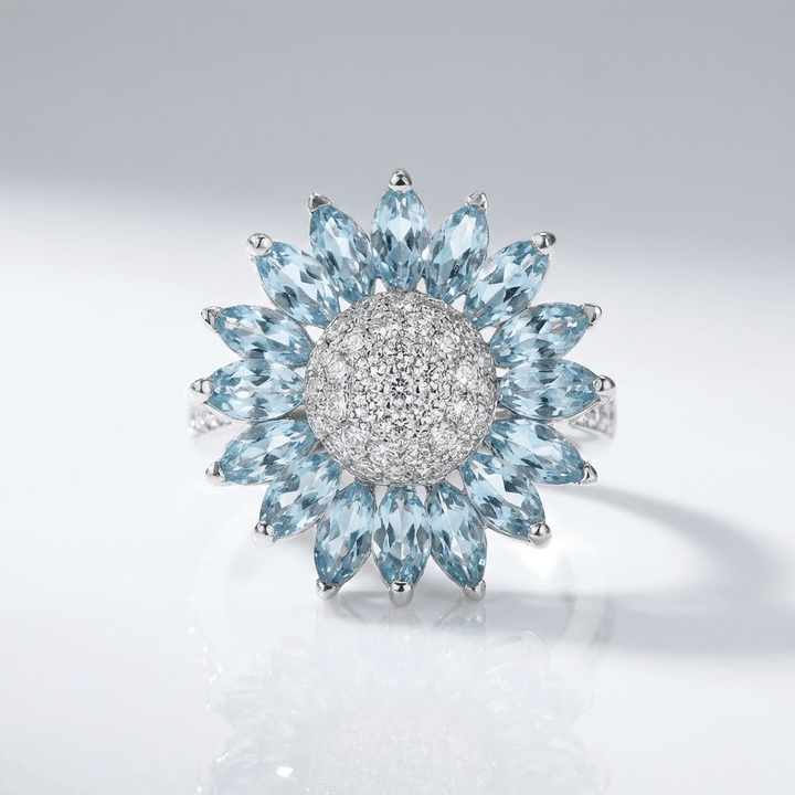 Silver Blue Topaz Flower Ring